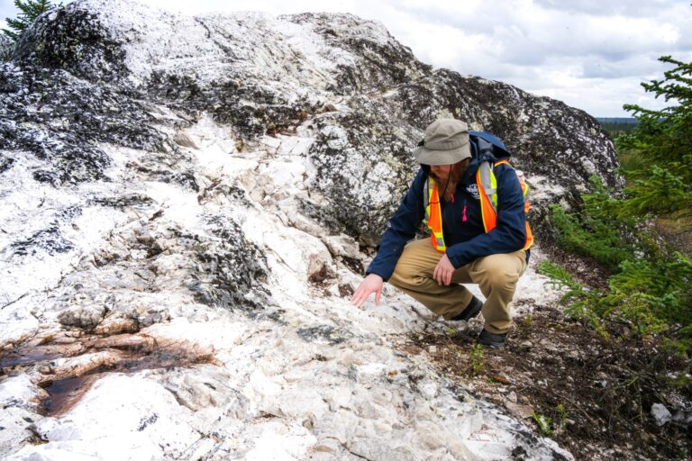 Darren Smith, our VP exploration,  examining the CV5 outcrop during site visit, September 2023